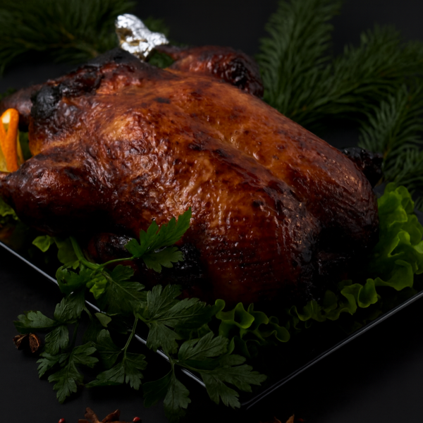 Cepta pildīta pīle ar āboliem, dzērvenēm un apelsīniem