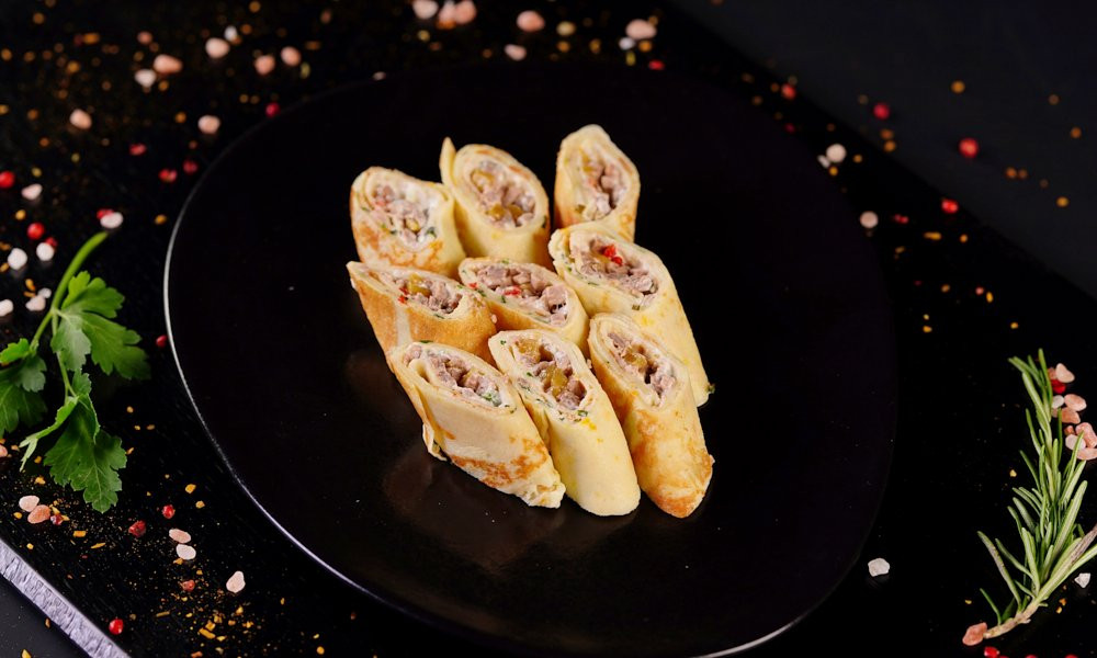 Rullīši ar pīles fileju un mango (150g)