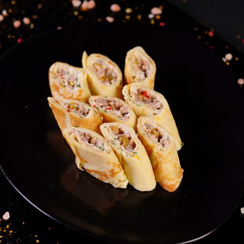Rullīši ar pīles fileju un mango (150g)
