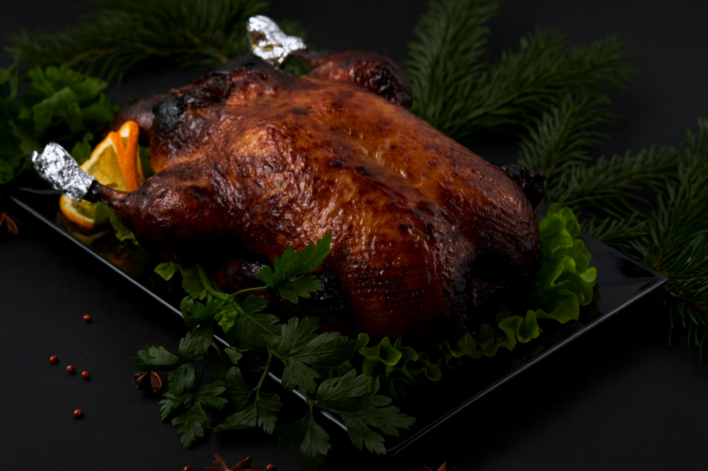 Cepta pildīta pīle ar āboliem, dzērvenēm un apelsīniem